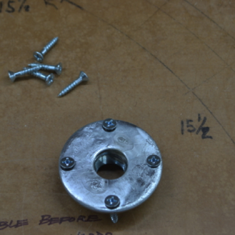 Washer-nut and mounting screws.